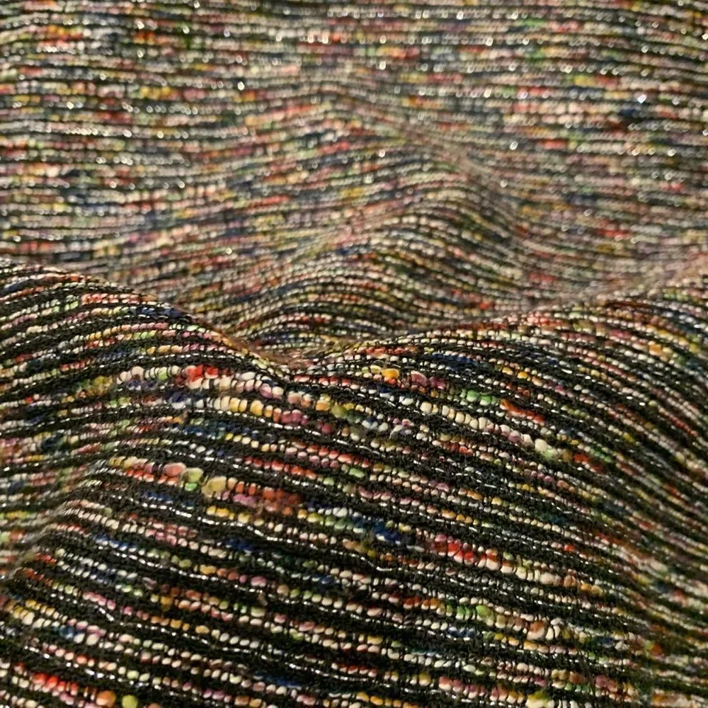 Tahari pencil skirt.  Size: 12. Small slit on back. Metallic thread throughout.